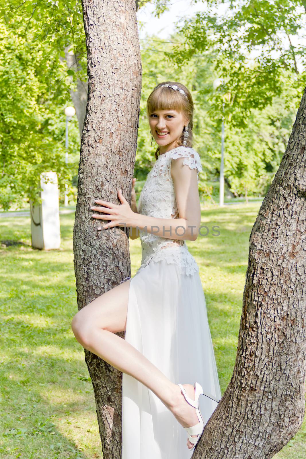 Bride with bare leg bent at the knee by Julialine