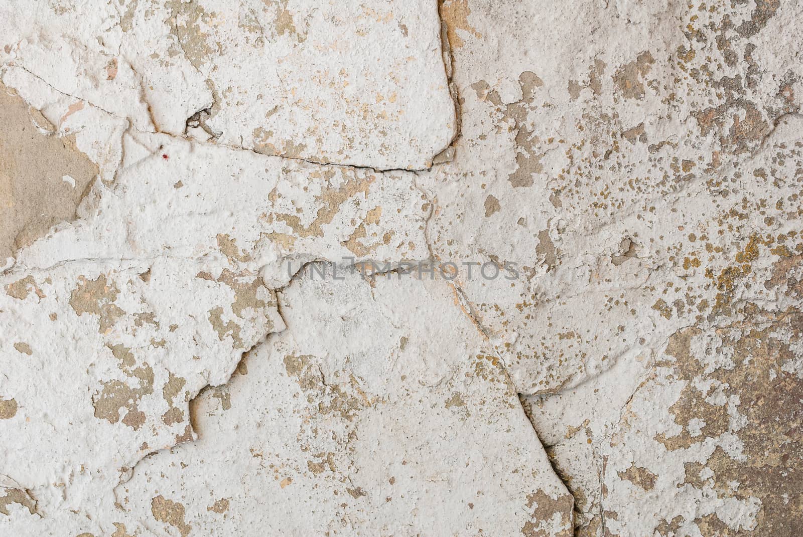 old chipped plaster on the concrete wall, grey texture, background by uvisni
