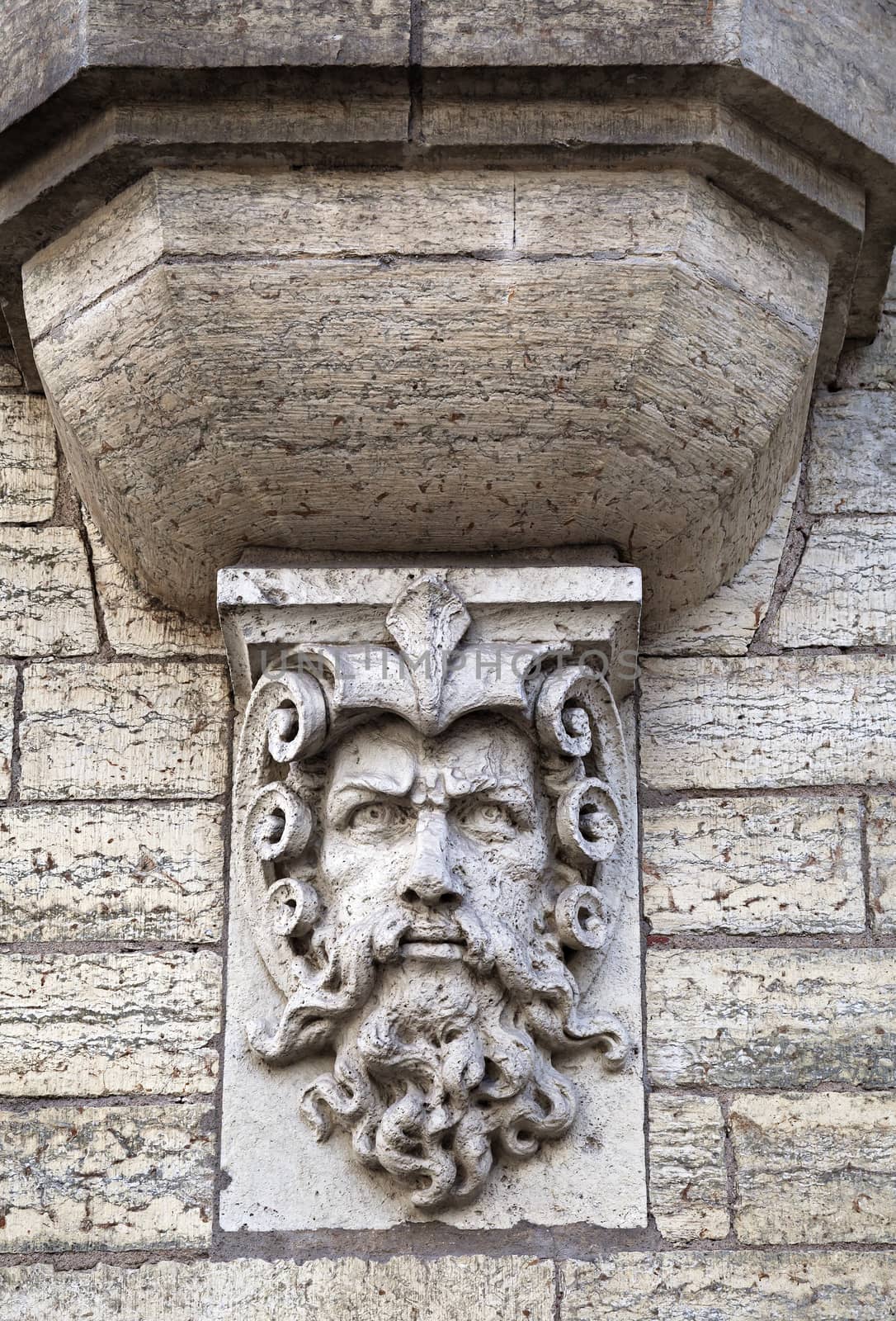 Man head relief, architecture detail in Tallinn, Estonia