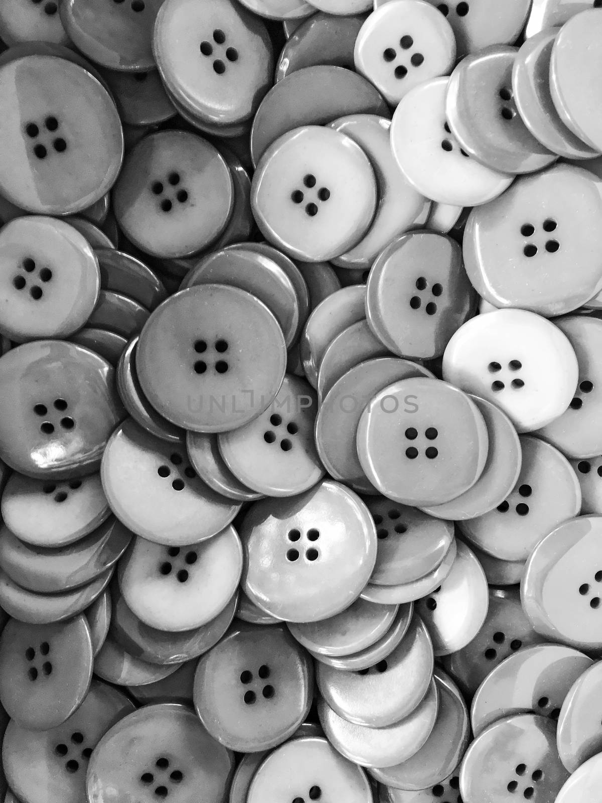 Black and white buttons background by anikasalsera