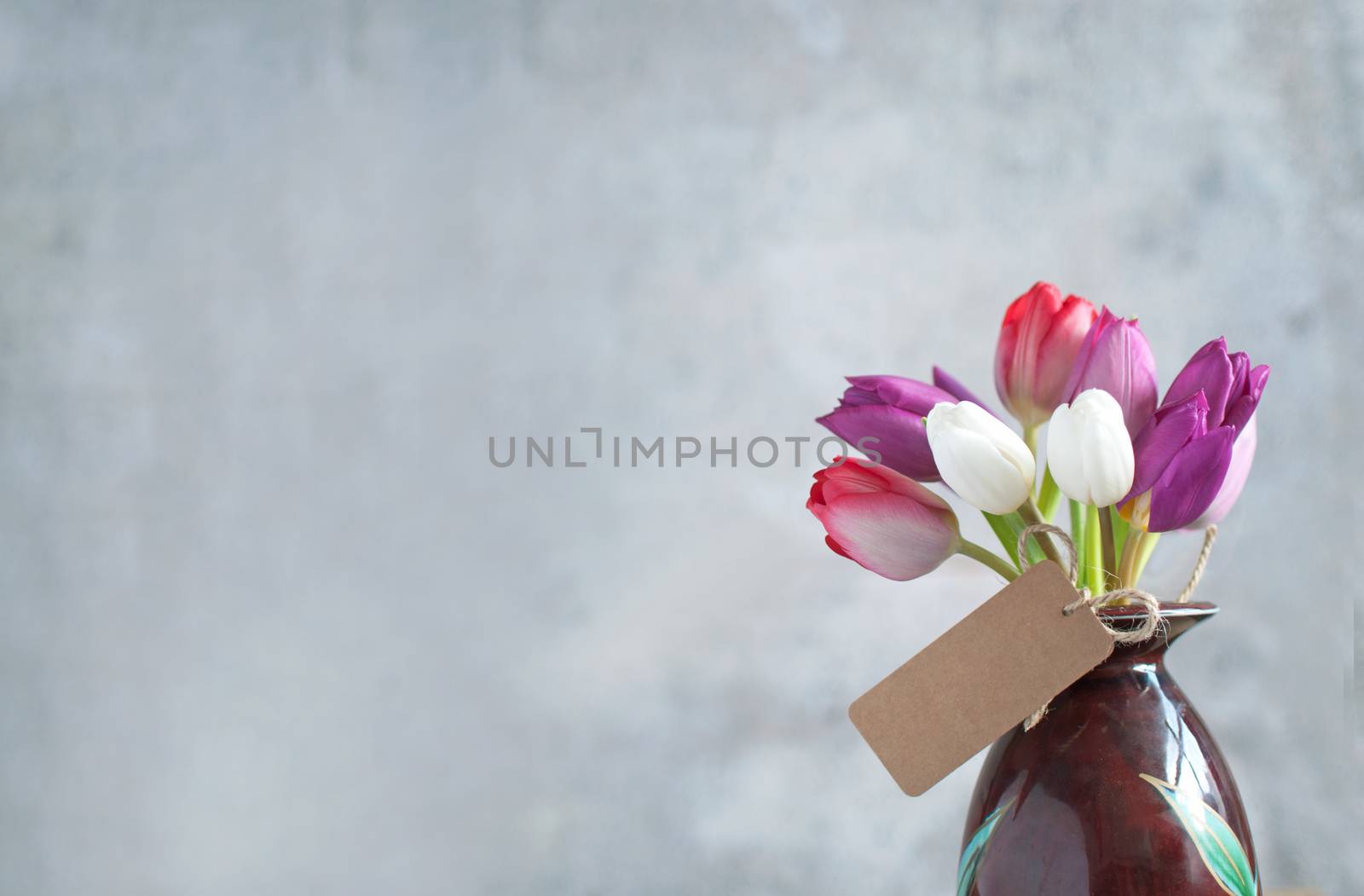 Selection of spring tulips with a gift label