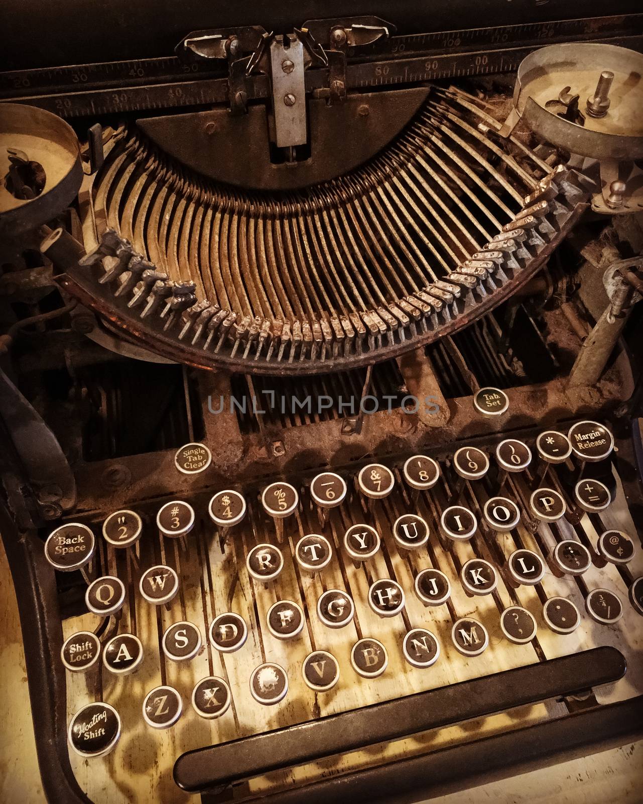 Old rusty and dusty typewriter by anikasalsera