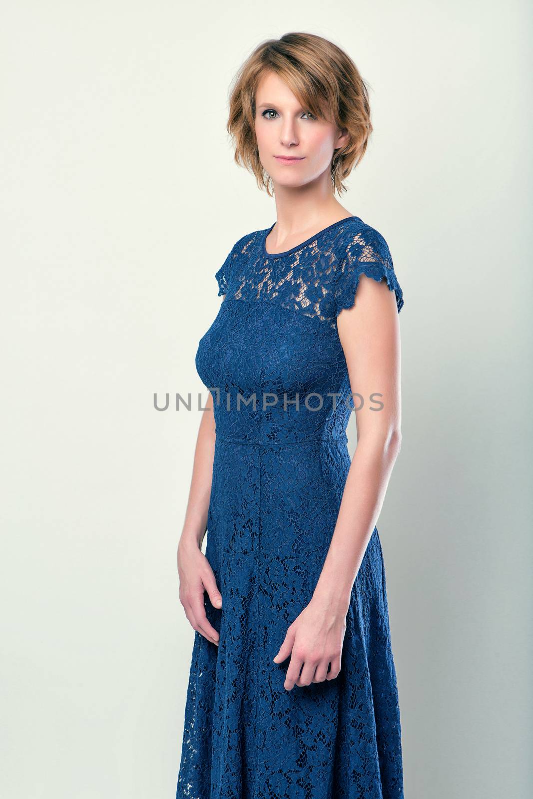 beauty attractive girl in blue lace clothes