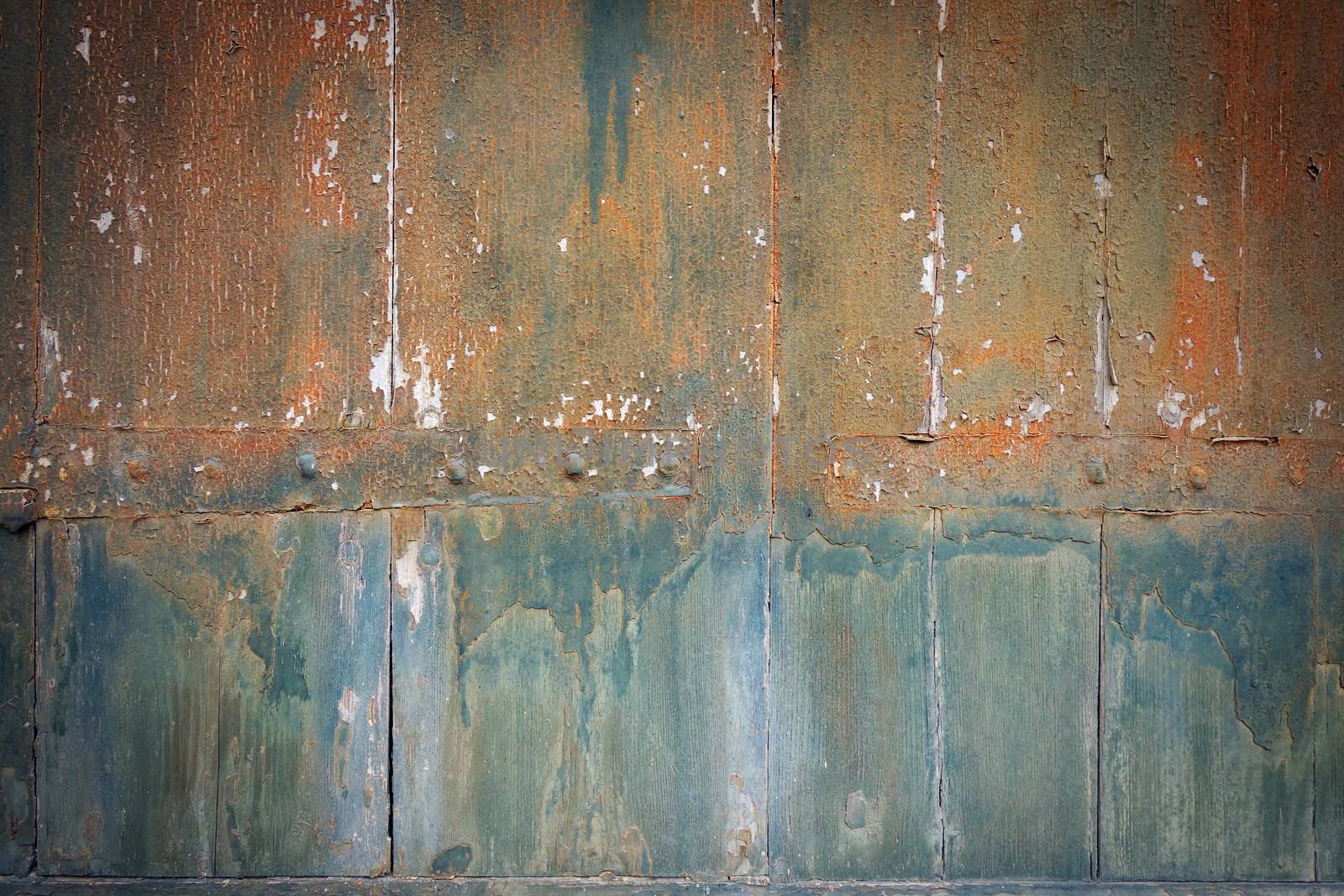 Old rusty painted wood board by daboost