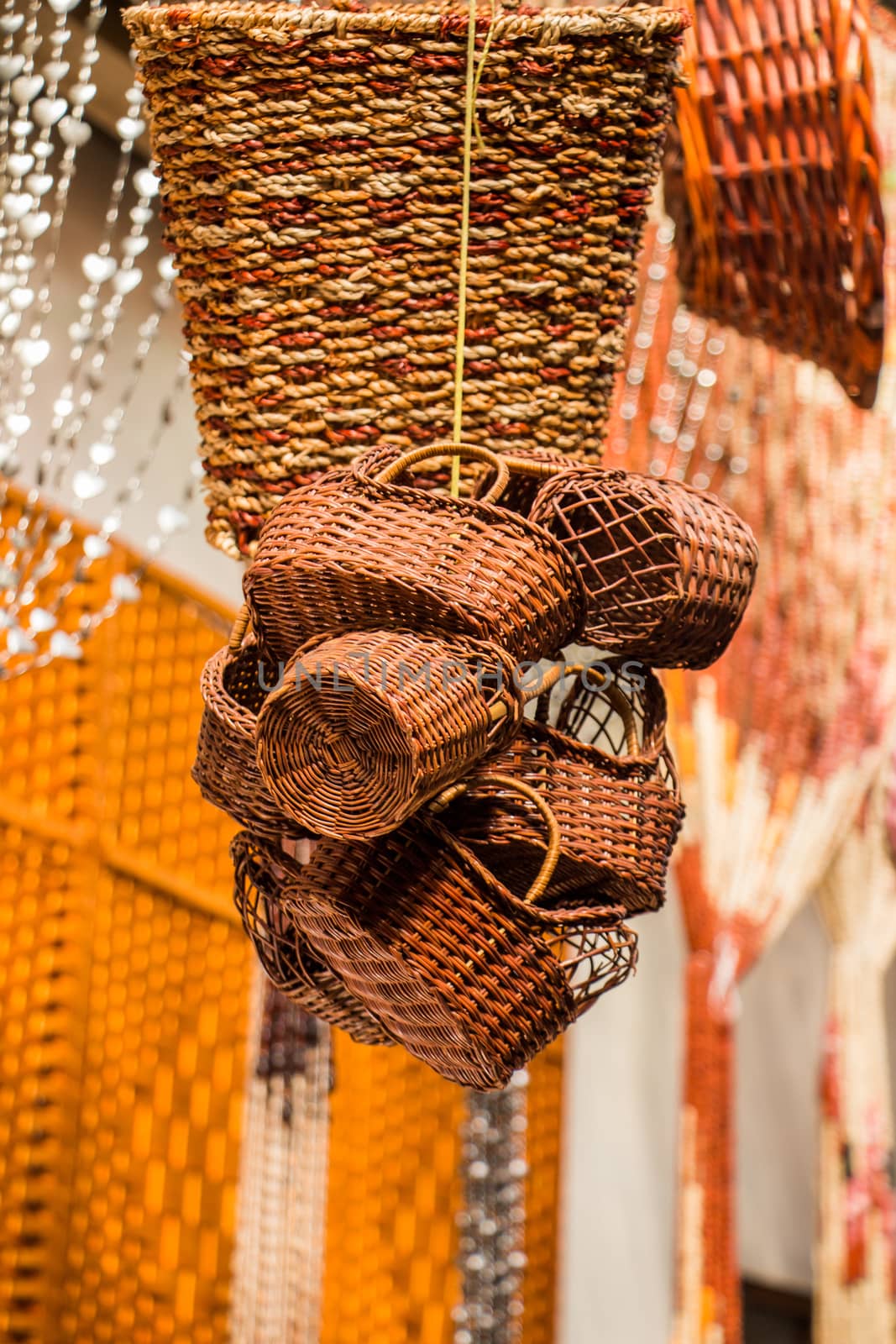 Empty wicker baskets are for sale in a market