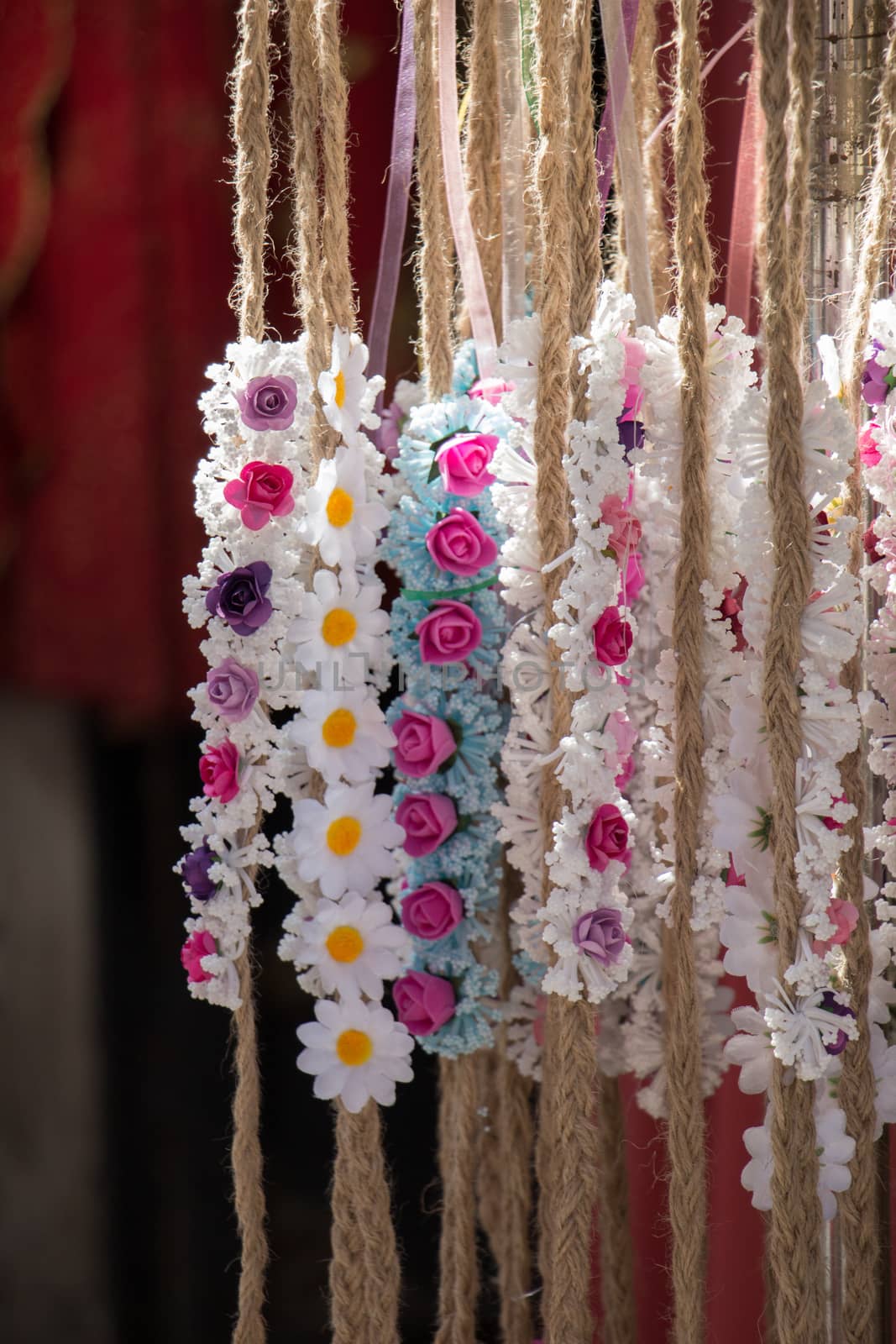 colorful crowns  for sale made of fake flowers