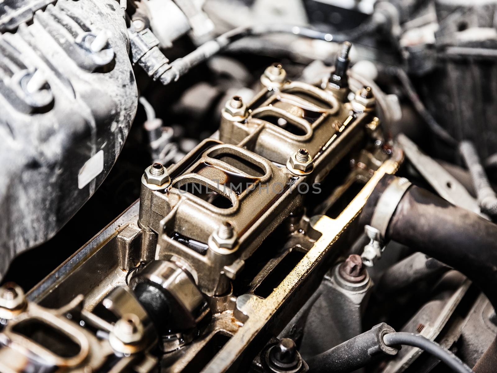 Vehicle motor or auto car engine at automobile repairing service or garage workshop
