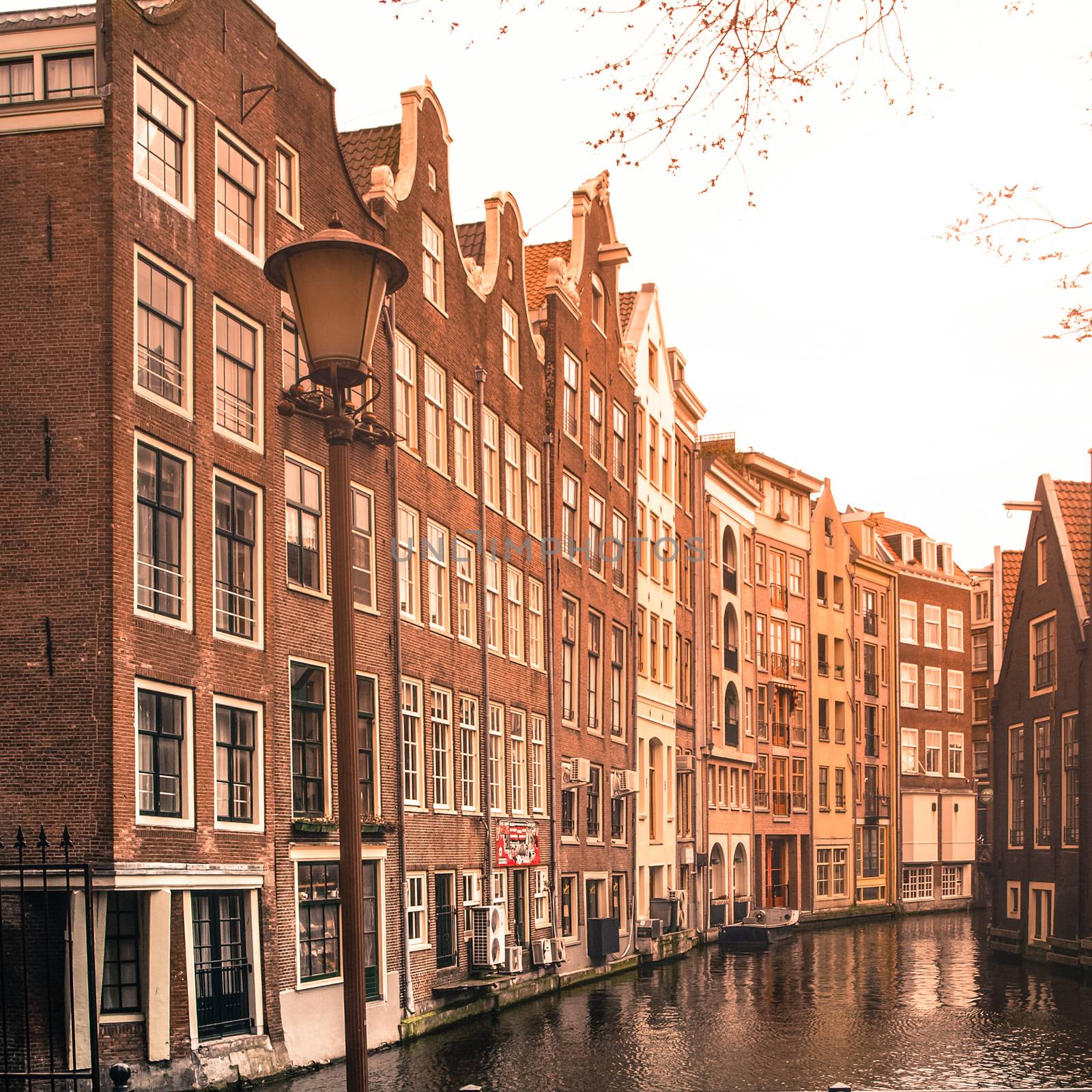 Amsterdam streets. View of narrow residential houses in historical city centre of Amsterdam, Netherlands by pyty