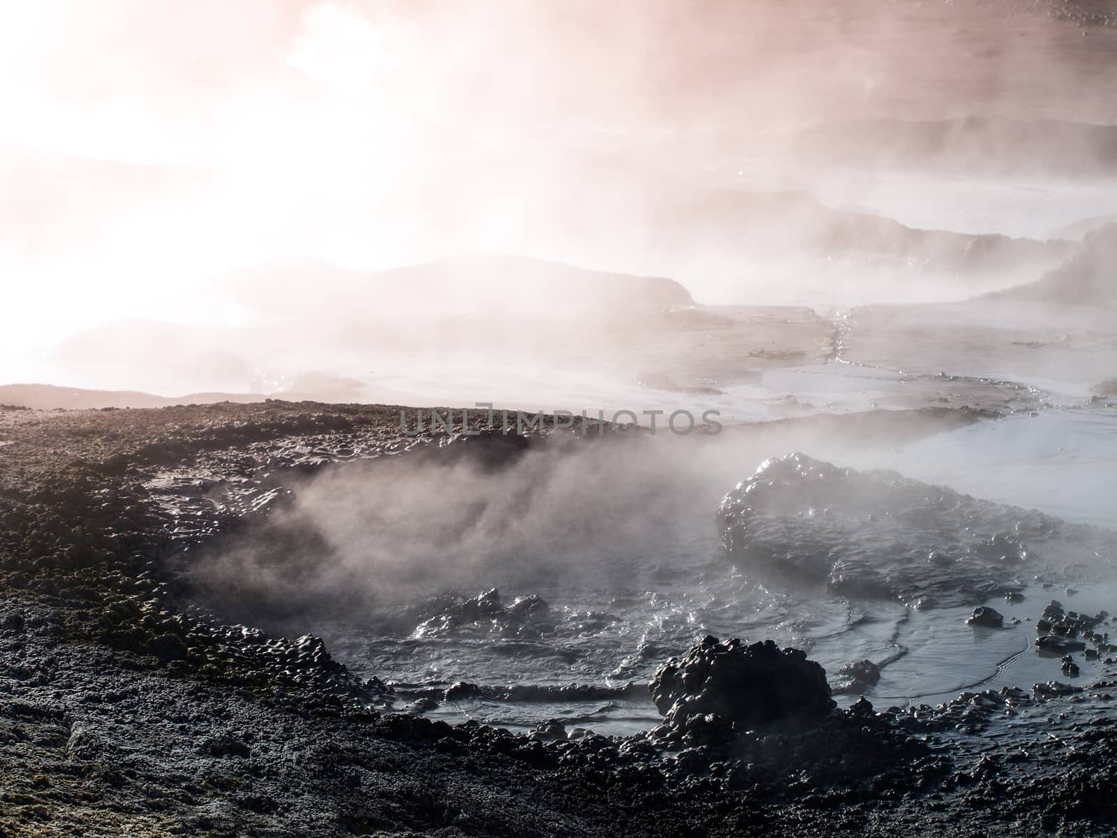 Morning at Sol de manana geyser with mud pots, Bolivian Andean Altiplano, Bolivia, South America.