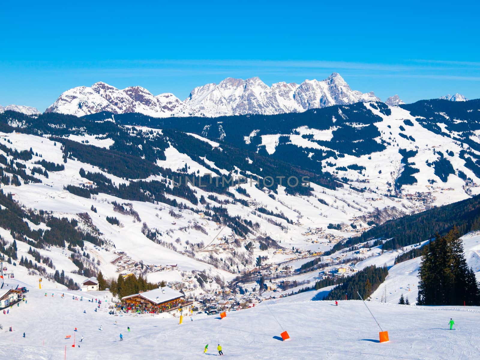 Panoramic view of winter mountains. Alpine peaks covered by snow.