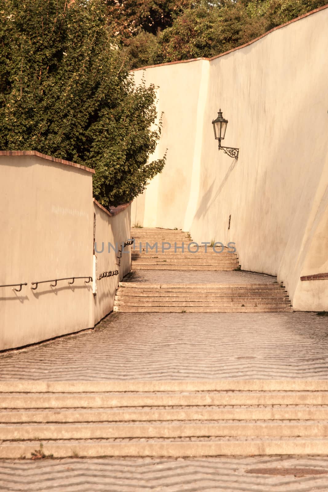 Old Castle Stairs on Prague Castle. Medieval stairway with vintage lamps, Prague, Czech Republic by pyty