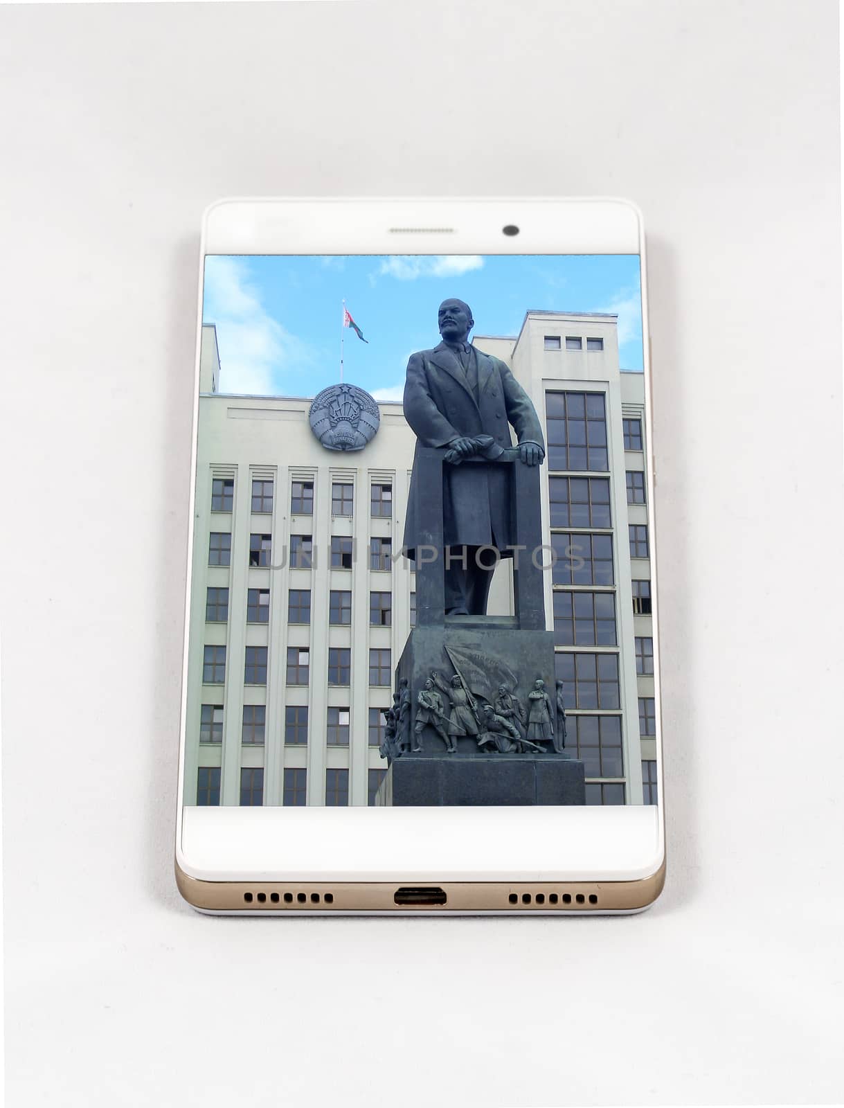 Modern smartphone with full screen picture of the Lenin Monument in Minsk, Belarus. Concept for travel smartphone photography. All images in this composition are made by me and separately available on my portfolio