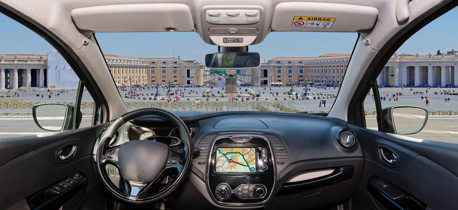 Looking through a car windshield with view over Saint Peter's Square in Vatican City, Rome, Italy