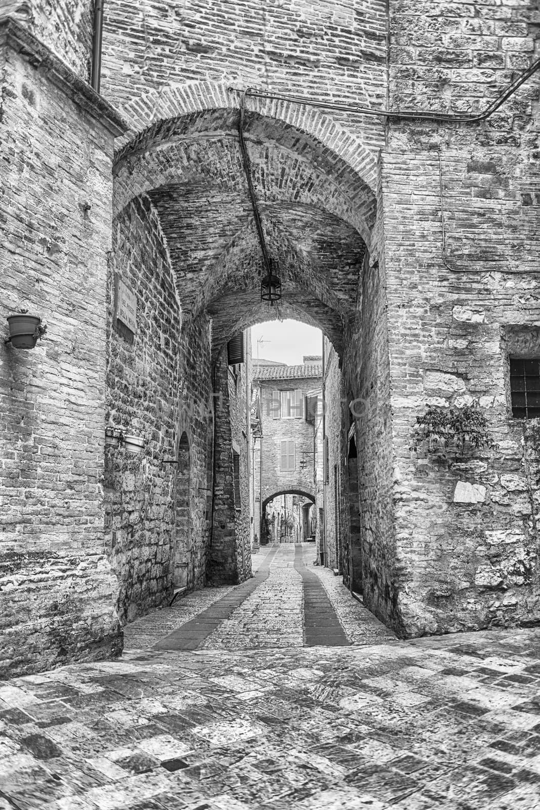 Walking in the picturesque and ancient streets of Assisi, one of the most beautiful medieval towns in central Italy