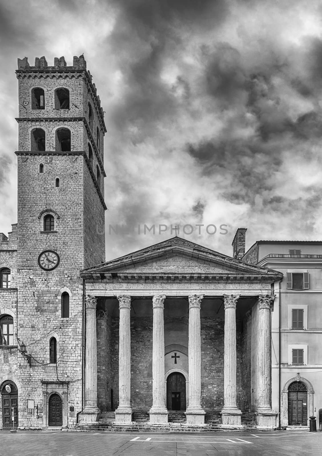 Facade of Temple of Minerva,  ancient Roman building and iconic landmark in Assisi, Italy