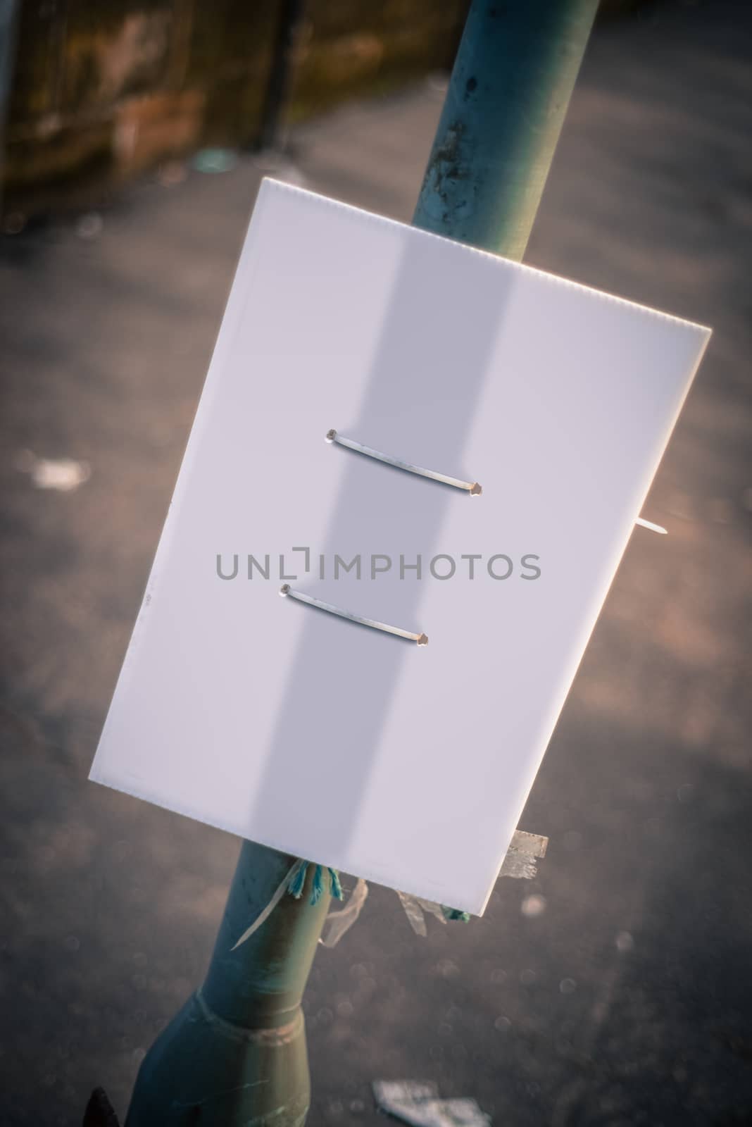 Retro Grungy Street Sign On A Lamppost Blank For Your Text