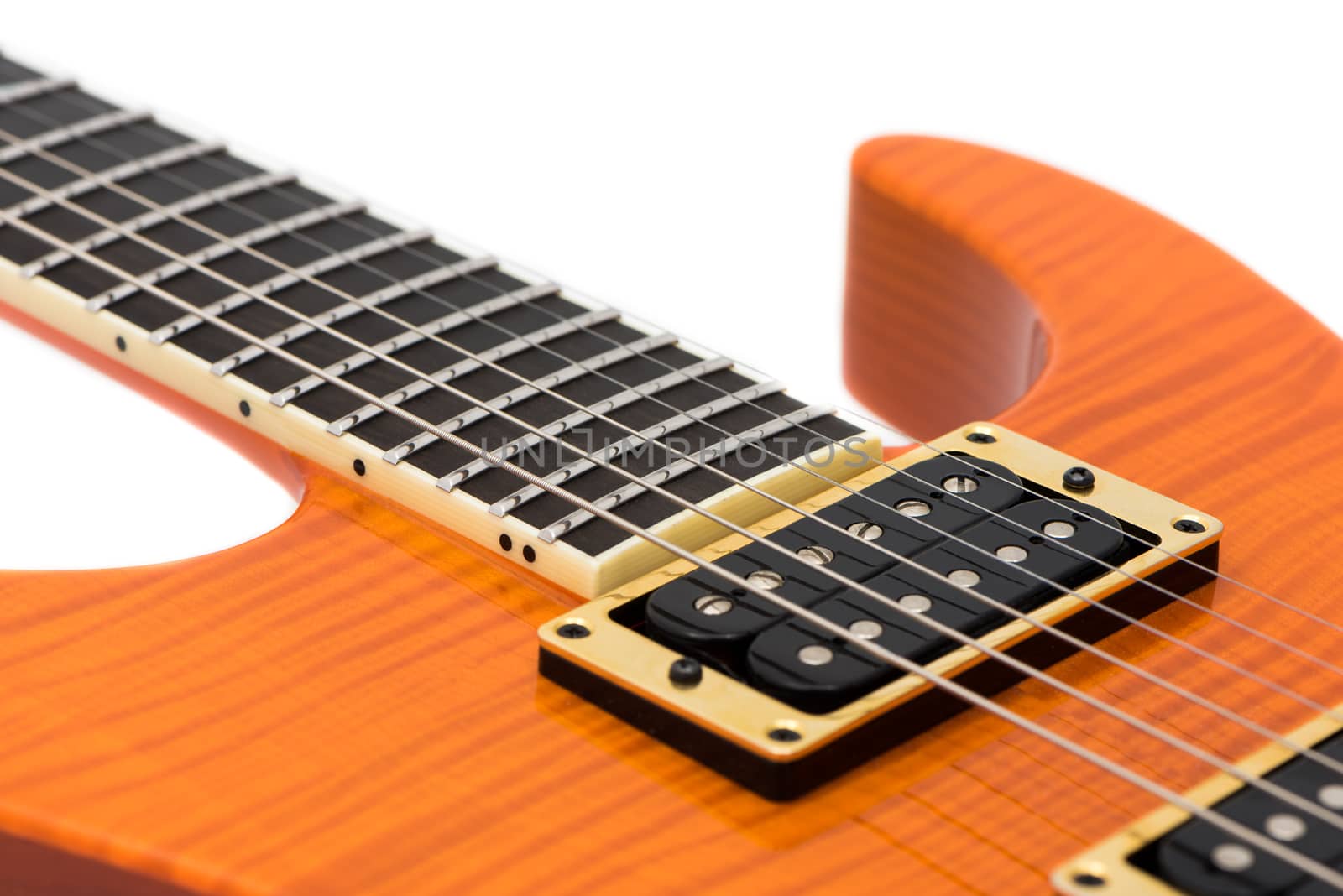 Detail of Orange Electric Guitar Body with Strings Isolated on White Background