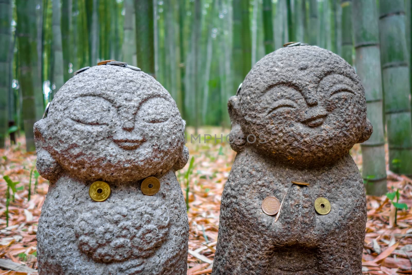 Small Jizo Statues in Arashiyama bamboo forest, Kyoto, Japan