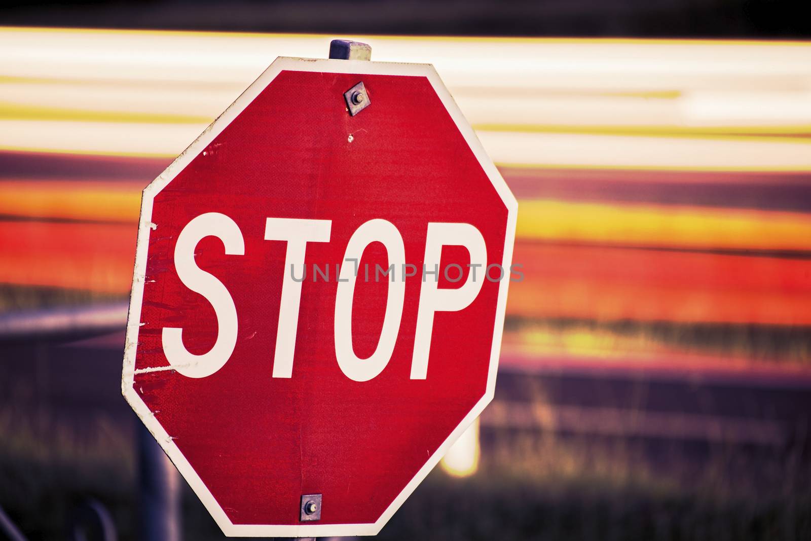 Close up of a red and white road stop sign.