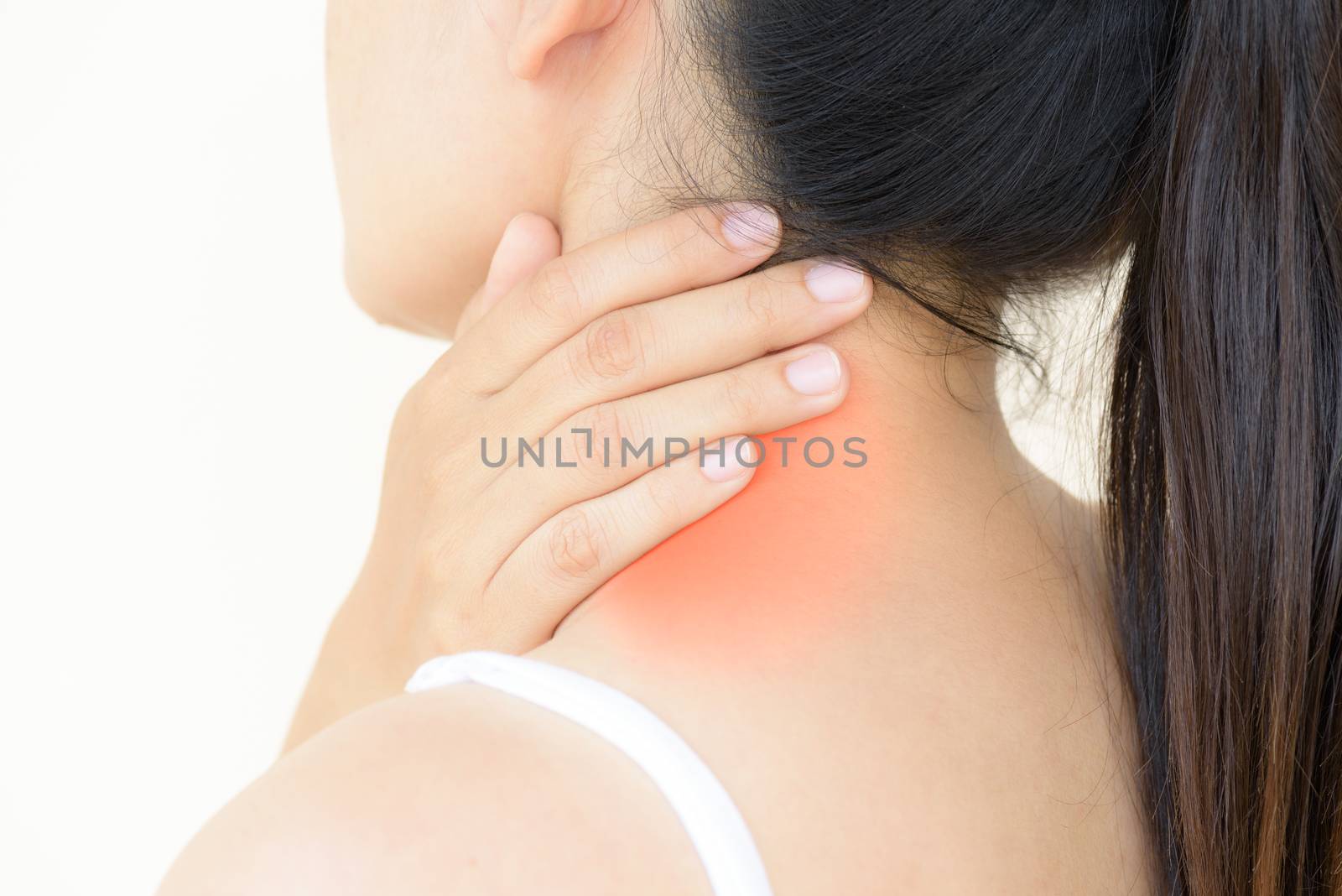 Closeup woman neck and shoulder pain and injury. Health care and medical concept.