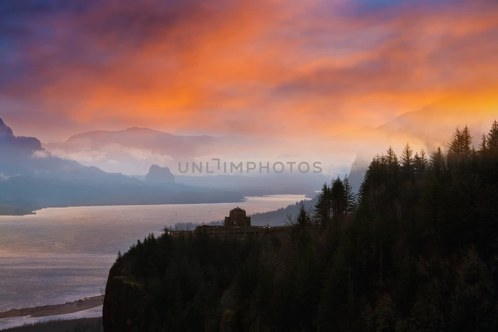 Vista House on Crown Point along Columbia River Gorge during sunrise