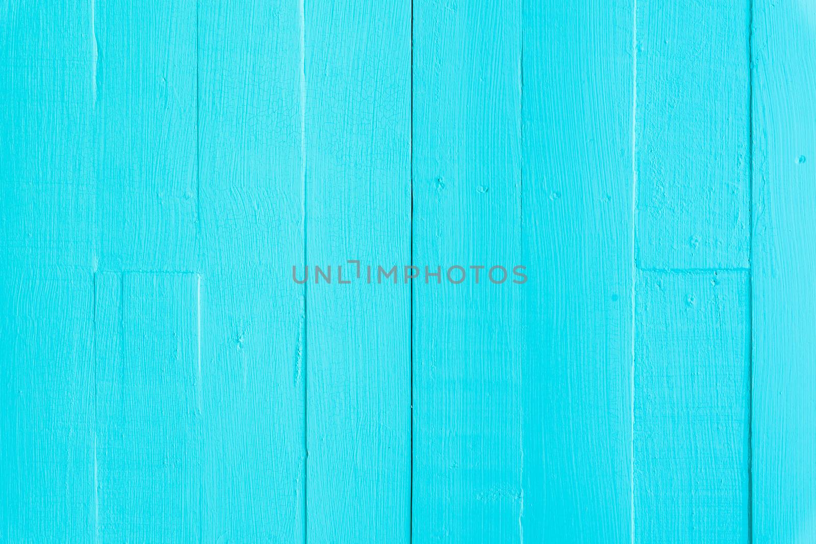 Pastel white and blue wooden table background texture.