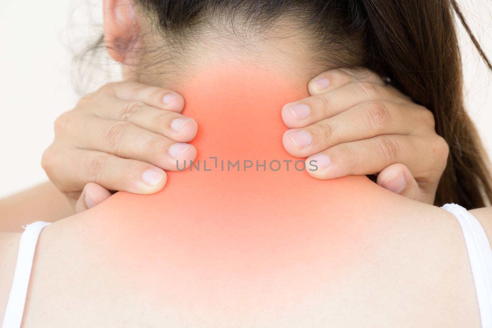 Closeup woman neck and shoulder pain and injury. Health care and by spukkato