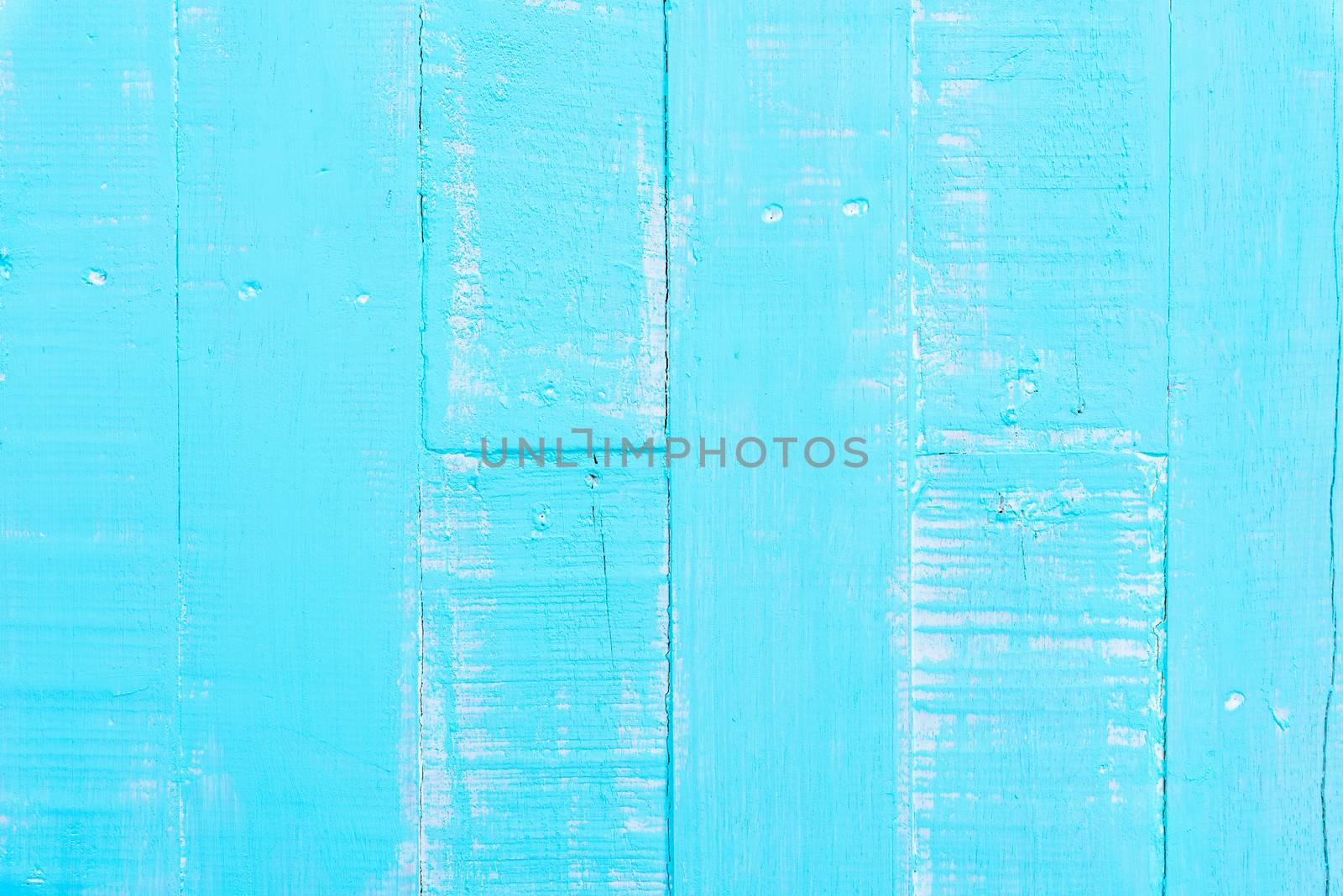 Pastel white and blue wooden table background texture.