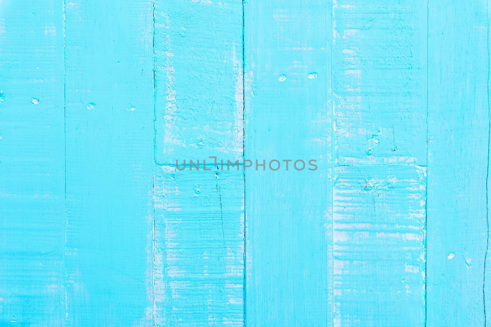 Pastel white and blue wooden table background texture.