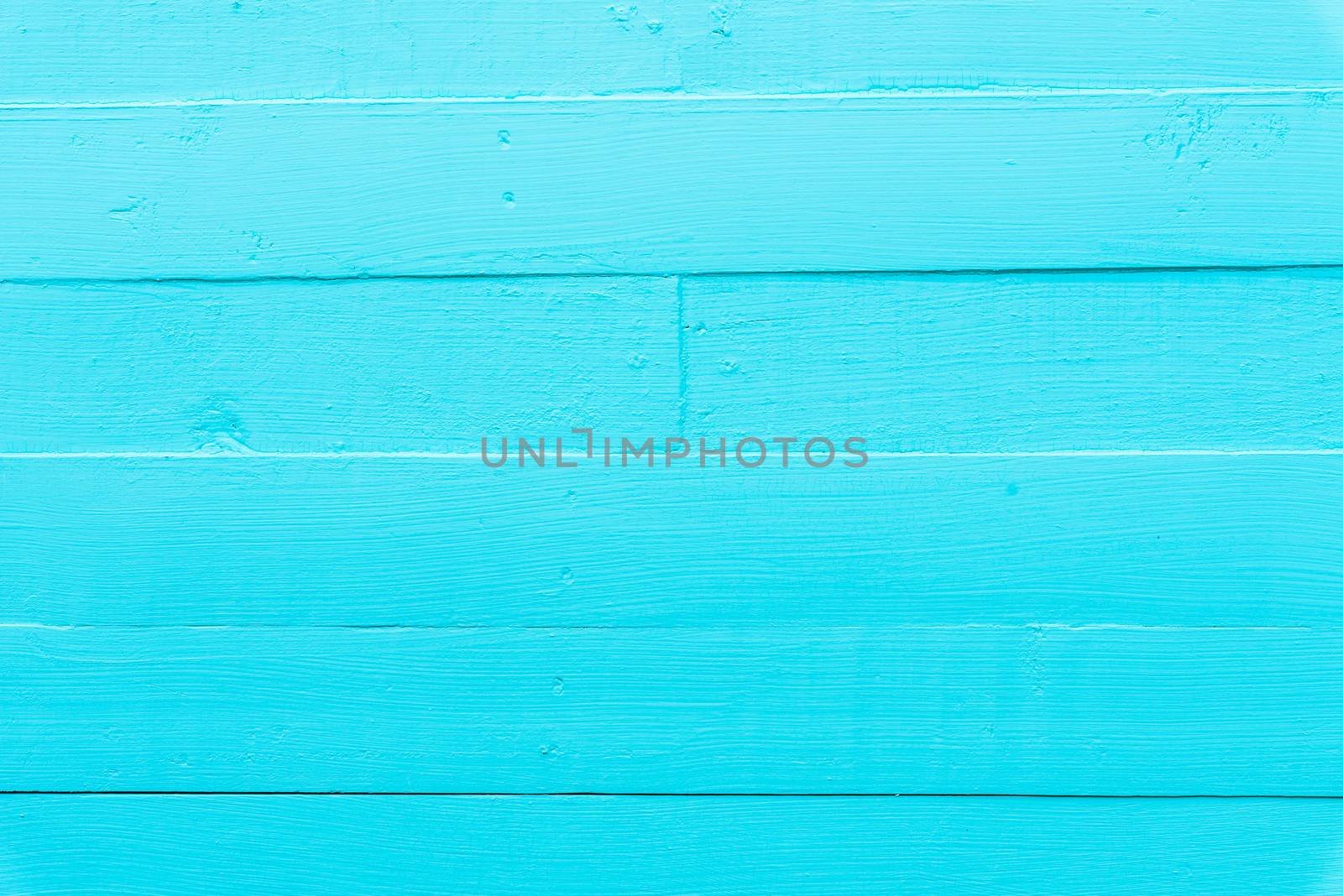 Pastel white and blue wooden table background texture.