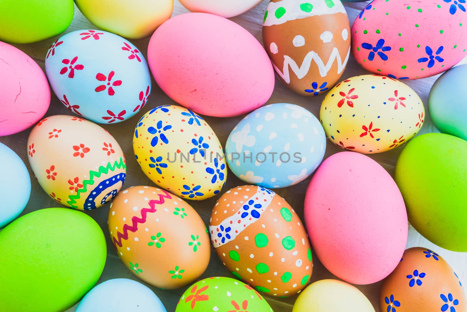 Happy easter!  Closeup Colorful Easter eggs background. Happy family preparing for Easter.