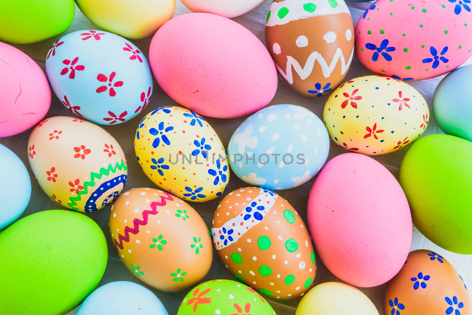 Happy easter!  Closeup Colorful Easter eggs background. Happy fa by spukkato