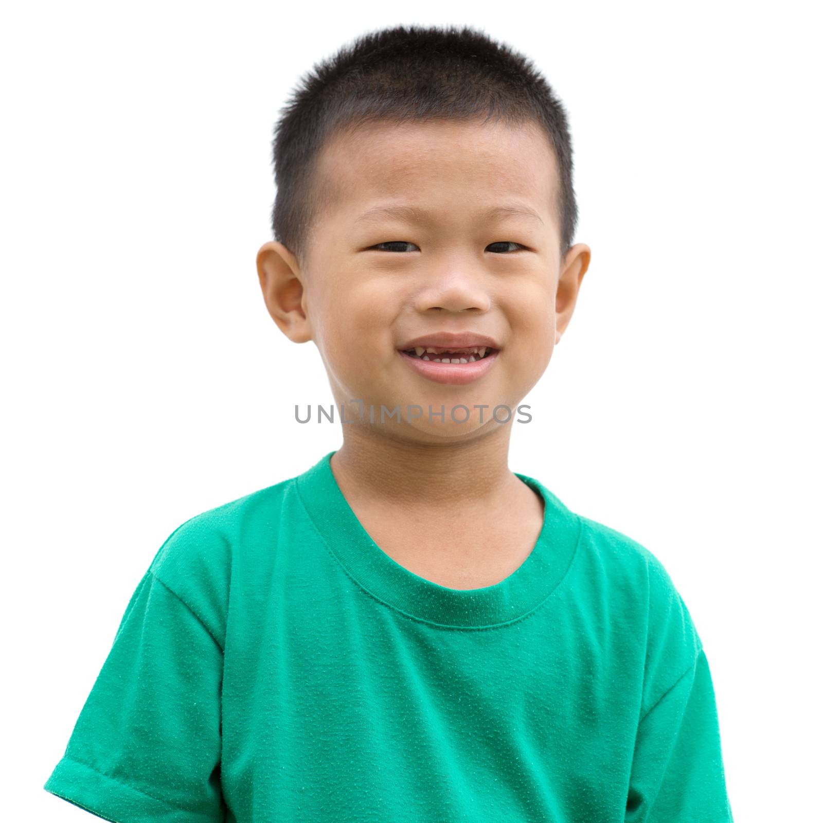 Headshot of happy Asian child smiling and looking at camera. Portrait of young boy isolated on white background.
