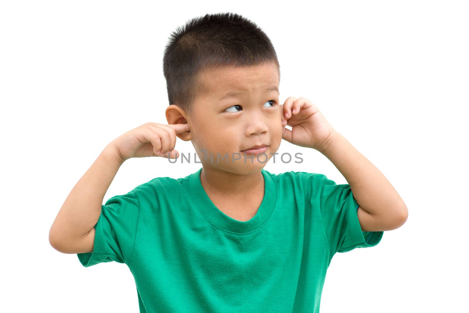 Asian child covering ears with hands and looking away. Portrait of young boy isolated on white background.