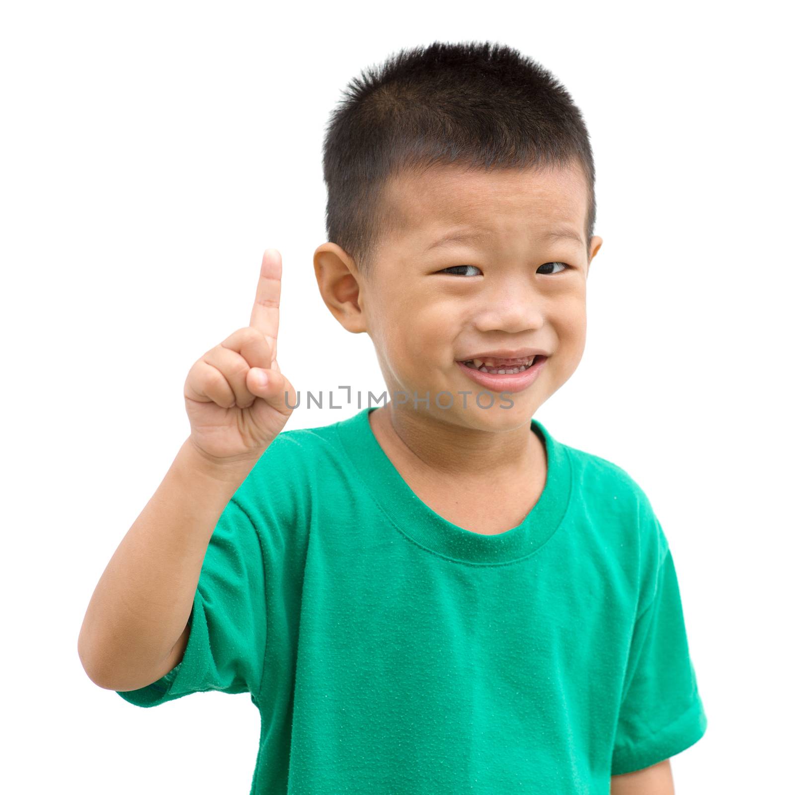 Asian child giving thumb up. Portrait of young boy isolated on white background.