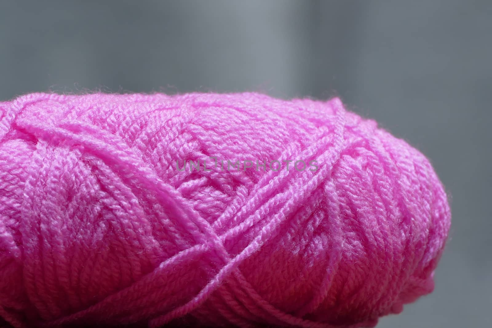 closeup of pink wool yarn