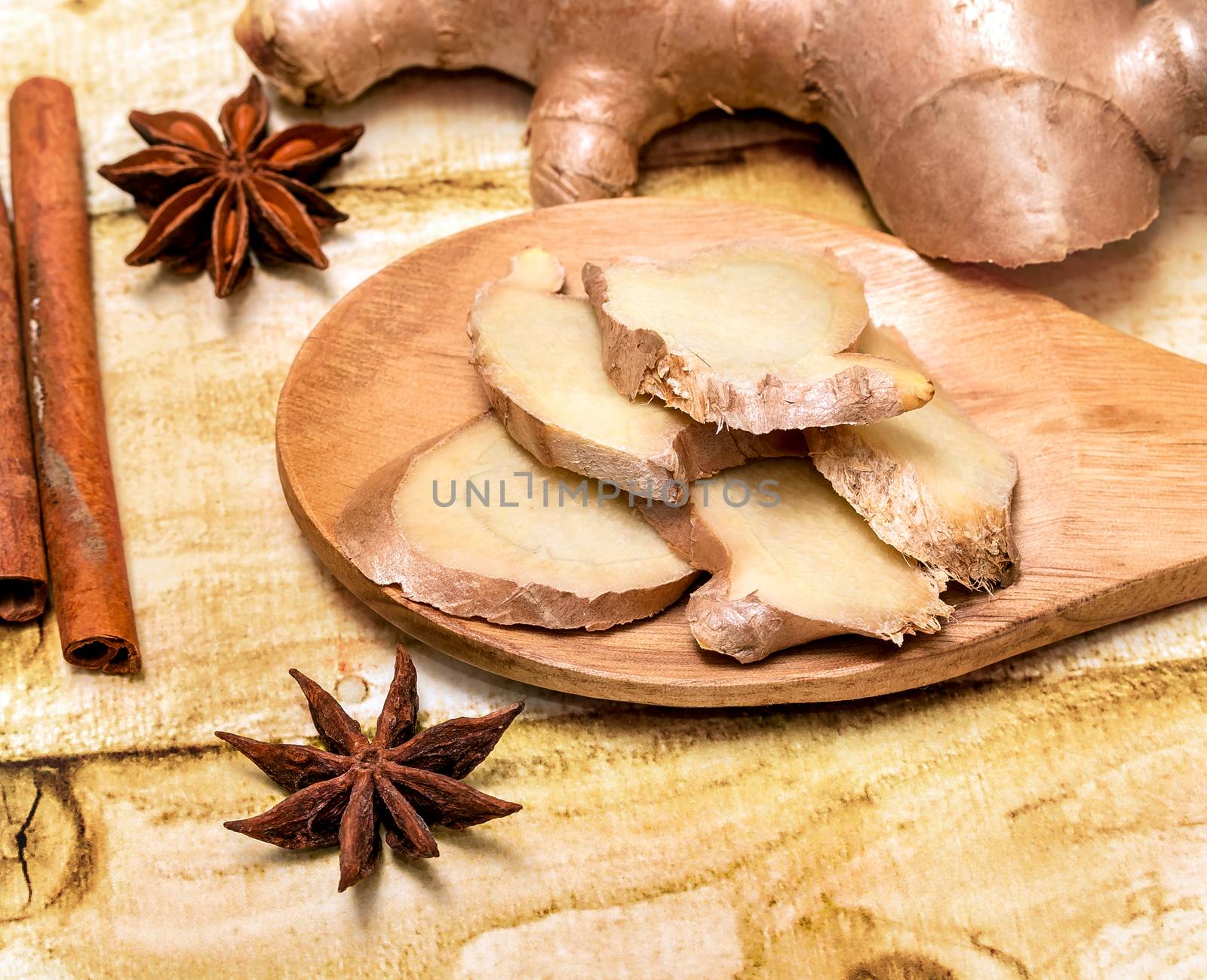 Sliced Ginger Root Showing Star Anise And Spices