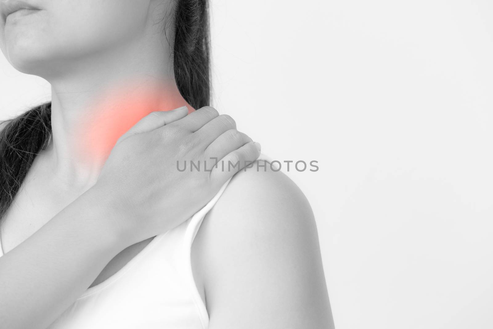 Closeup woman shoulder pain and injury. Health care and medical  by spukkato