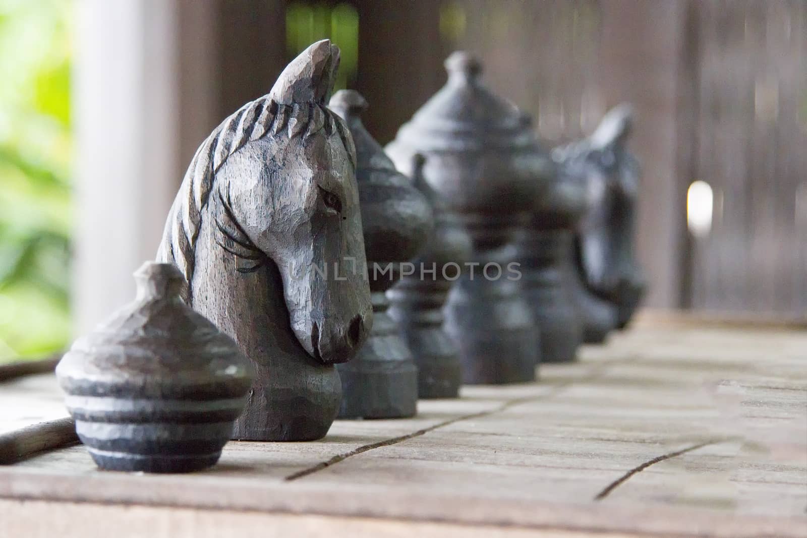 Chess horse made of black wood on board by TakerWalker