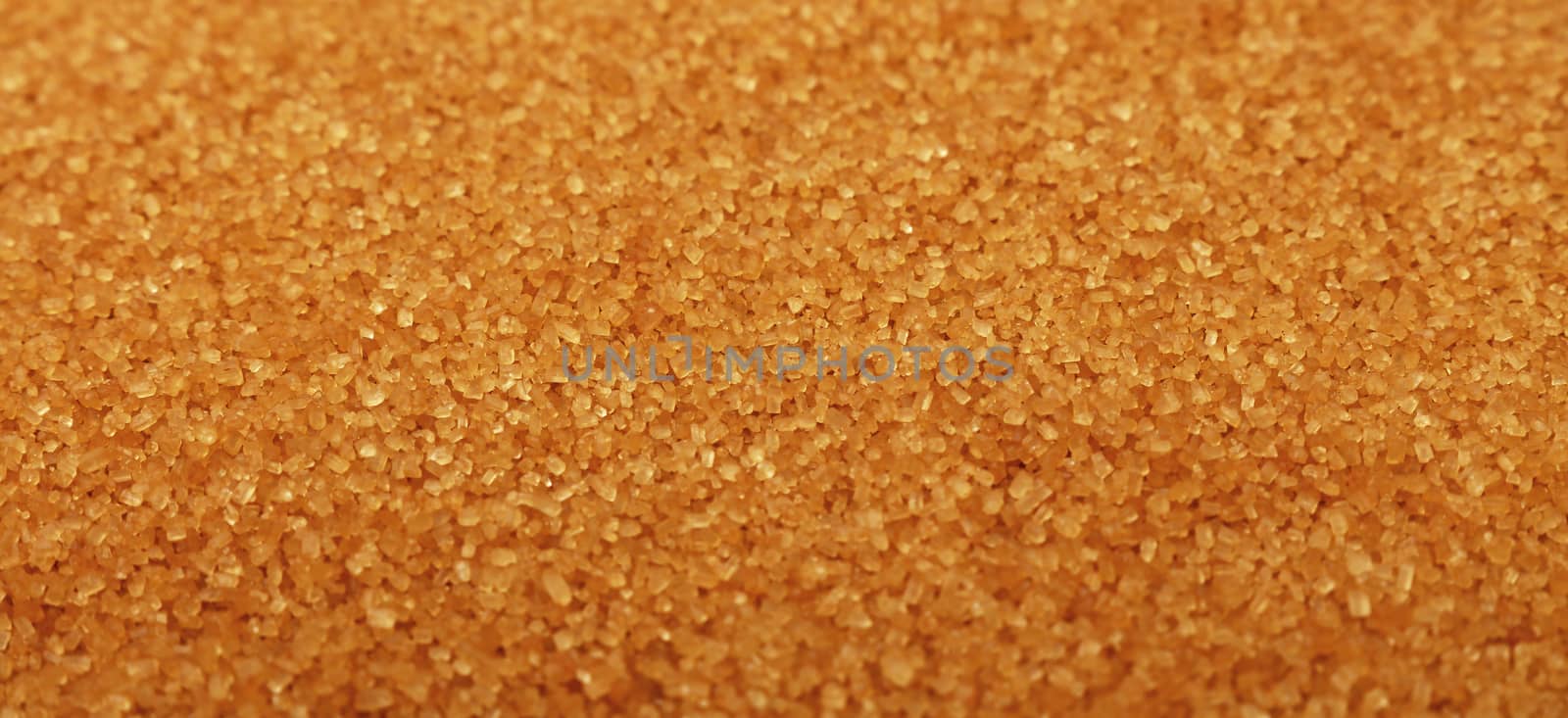 Close up background of brown cane sugar by BreakingTheWalls