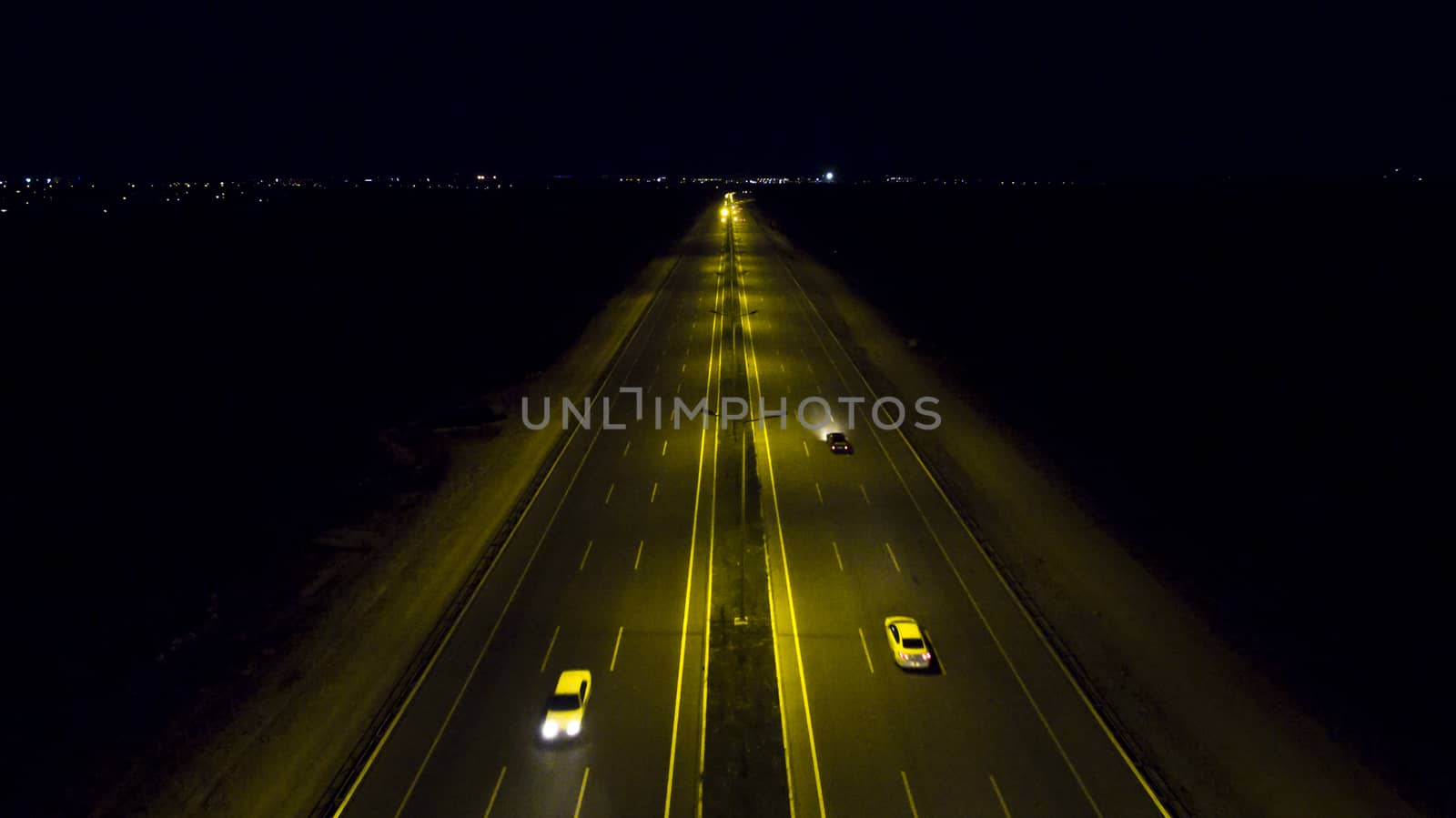 Aerial, vertical - Traffic at night. by oaltindag