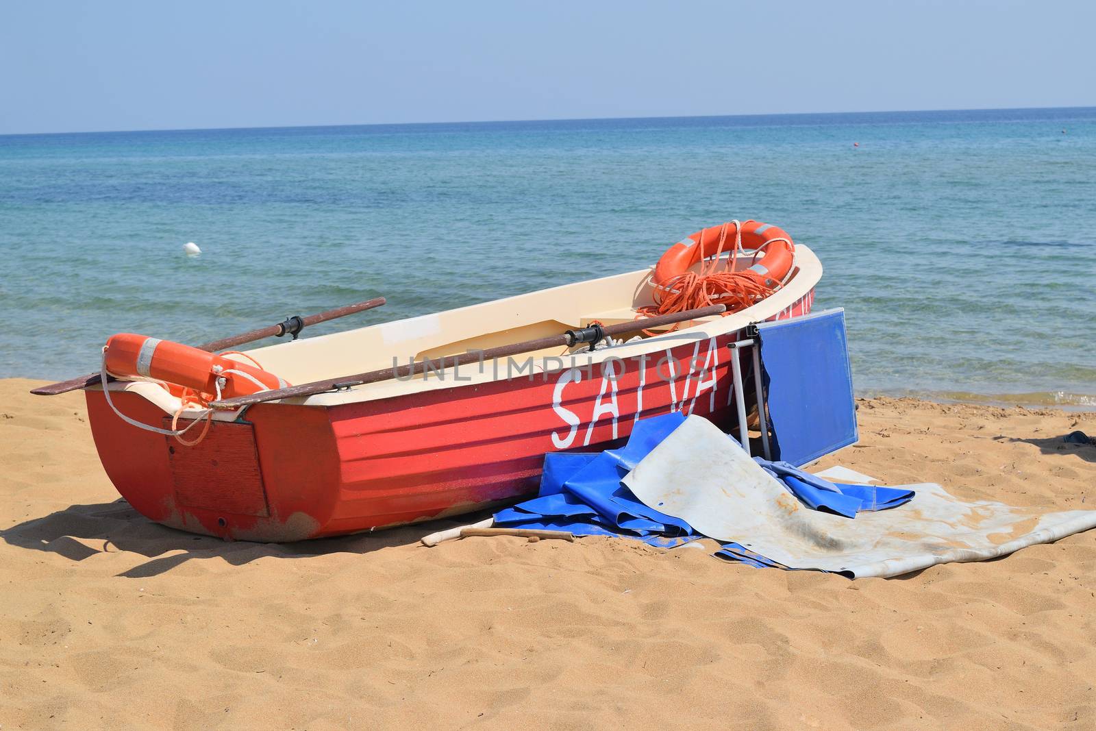 rescue boat on the beach in summer