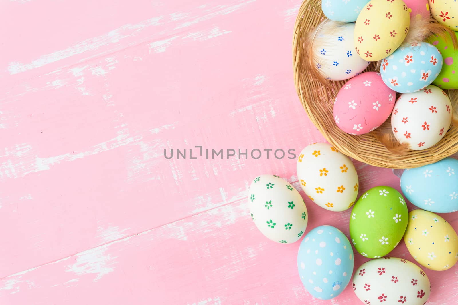 Happy easter! Colorful of Easter eggs in nest with paper star, f by spukkato