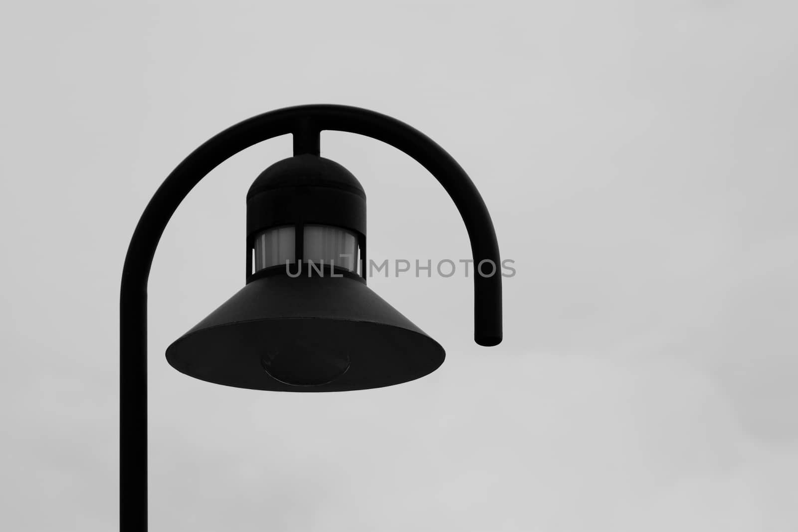 Black lamp with white background