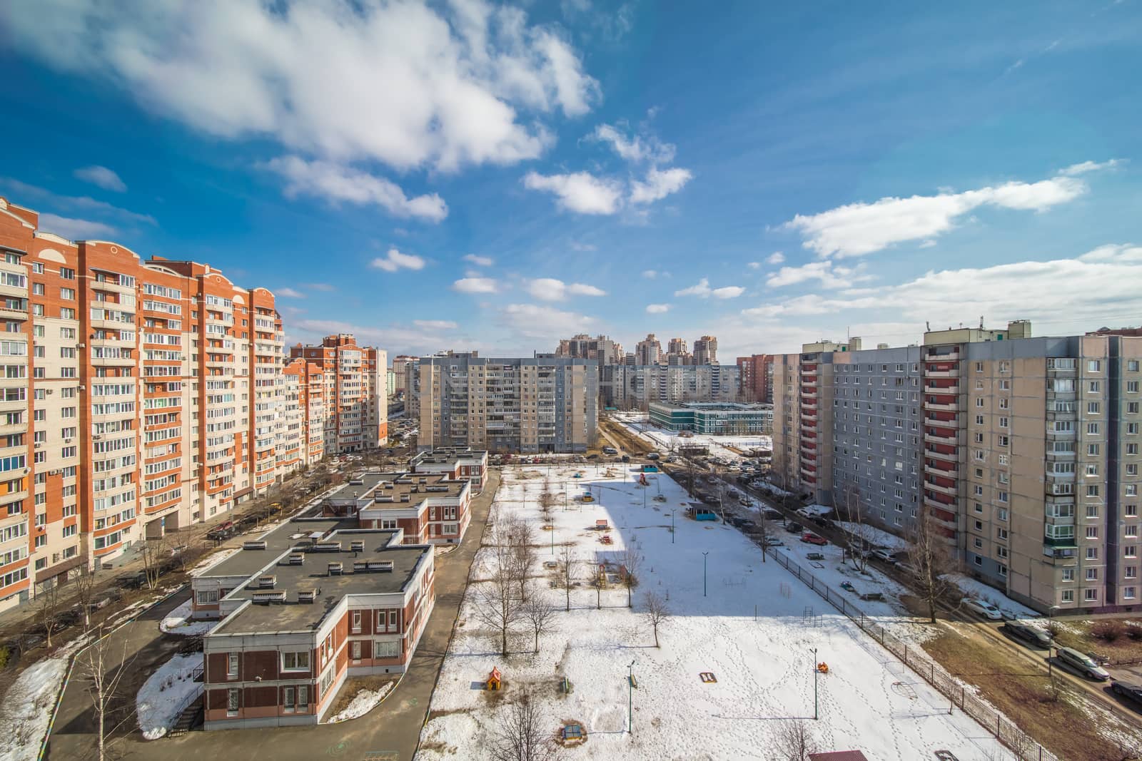 New modern residential building against blue sky in winter