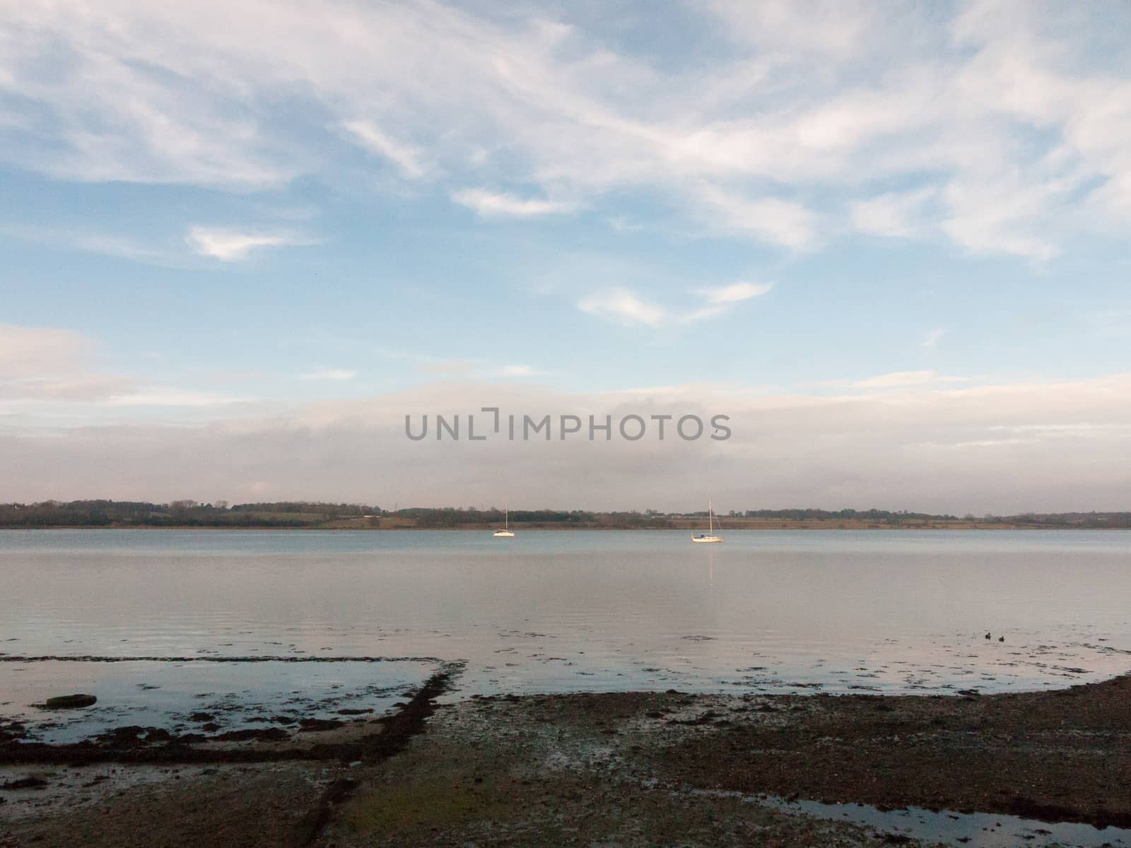 open ocean bay of water day sky sea coast no people boats fresh; essex; england; uk