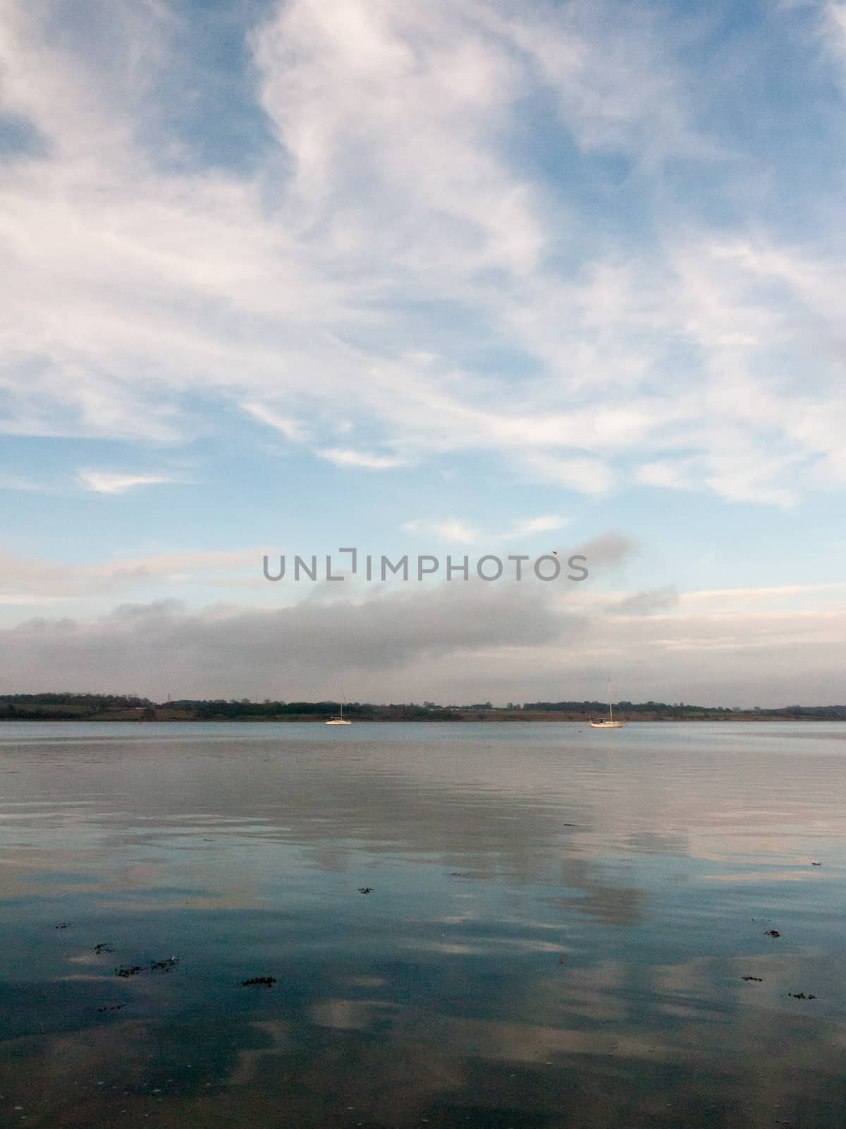 open ocean bay of water day sky sea coast no people boats fresh; essex; england; uk