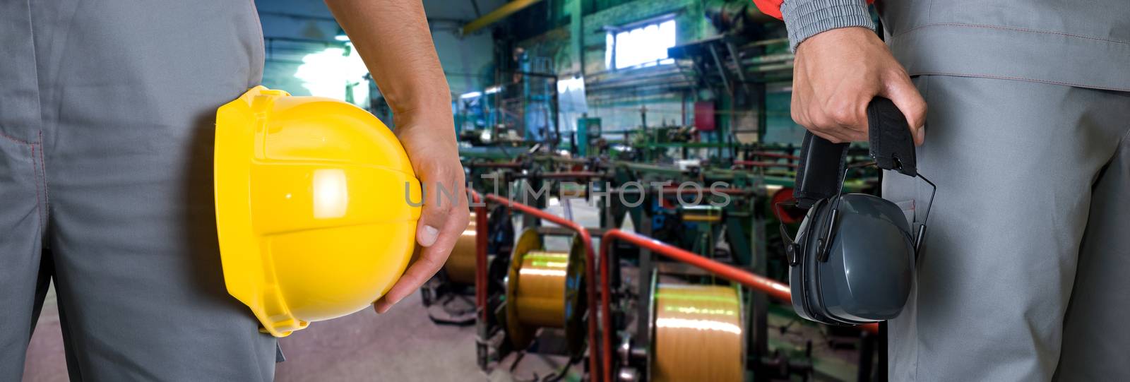 Closeup of workers in manufacturing plant