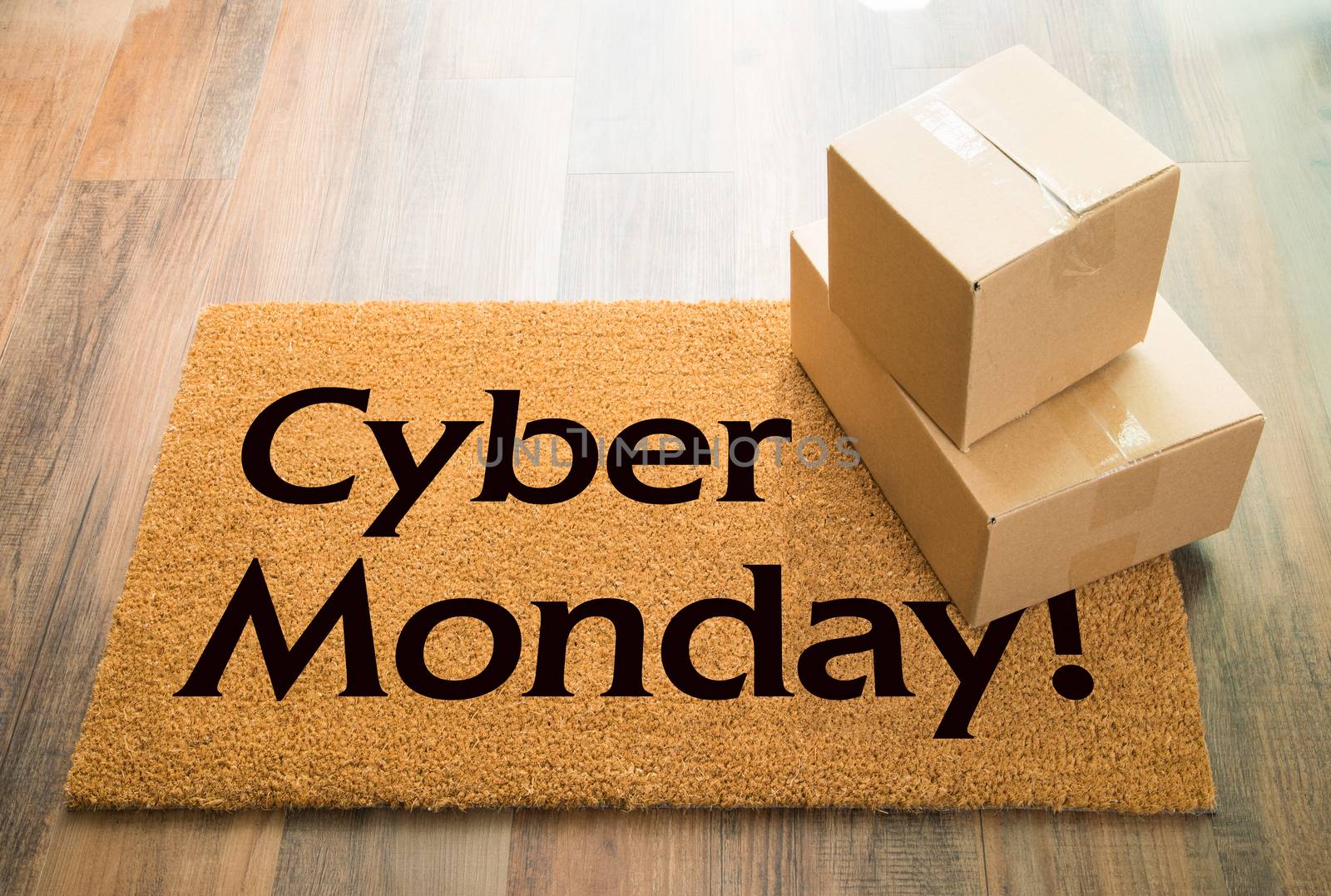 Cyber Monday Welcome Mat On Wood Floor With Shipment of Boxes by Feverpitched