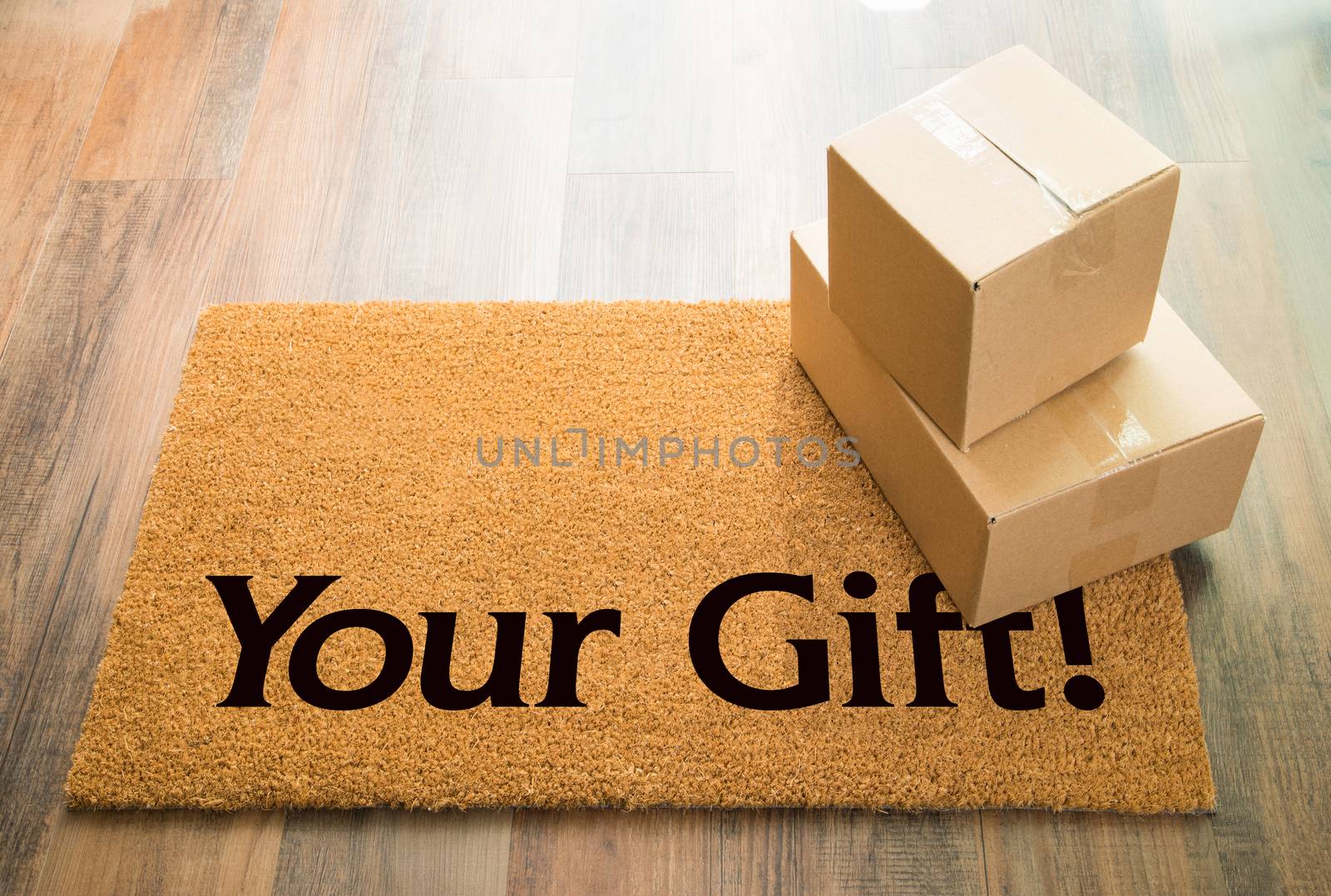 Your Gift Welcome Mat On Wood Floor With Shipment of Boxes by Feverpitched